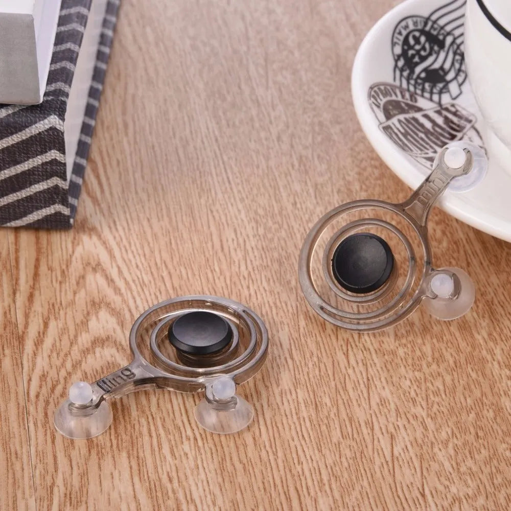 Universal mini joystick pair for mobile phone touch screen gaming in clear and black colour