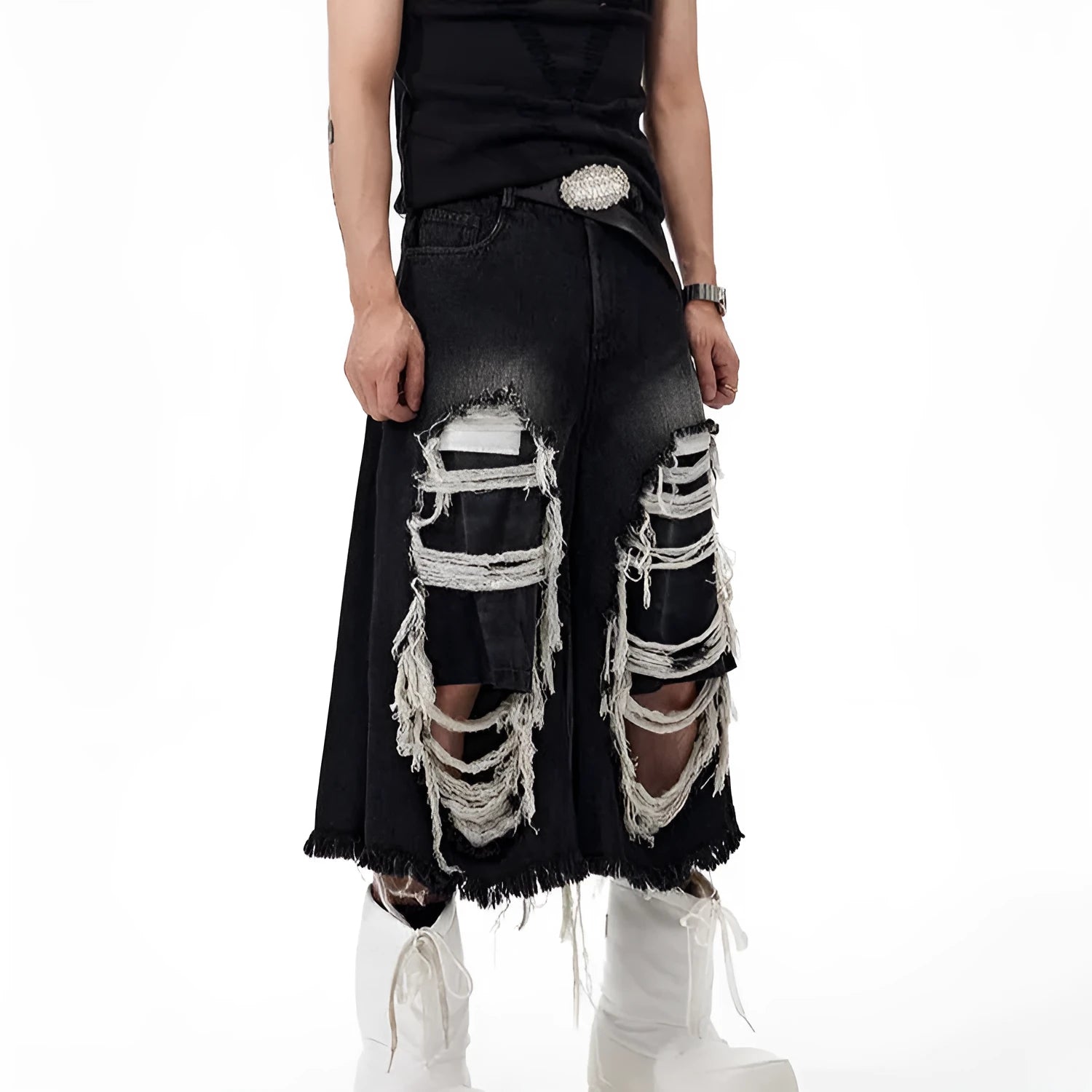 Black women's cropped wide leg jeans with ripped patch details and a mid-high waist.