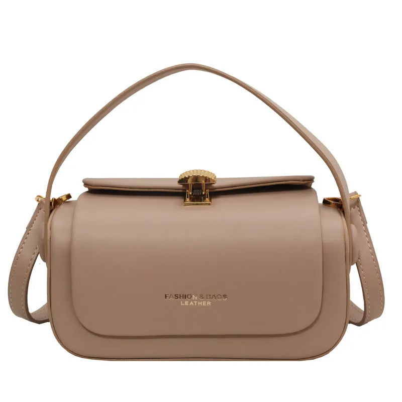 Women's personalised PU shoulder bag with letter stitching in beige, showing messenger-style strap and structured shape