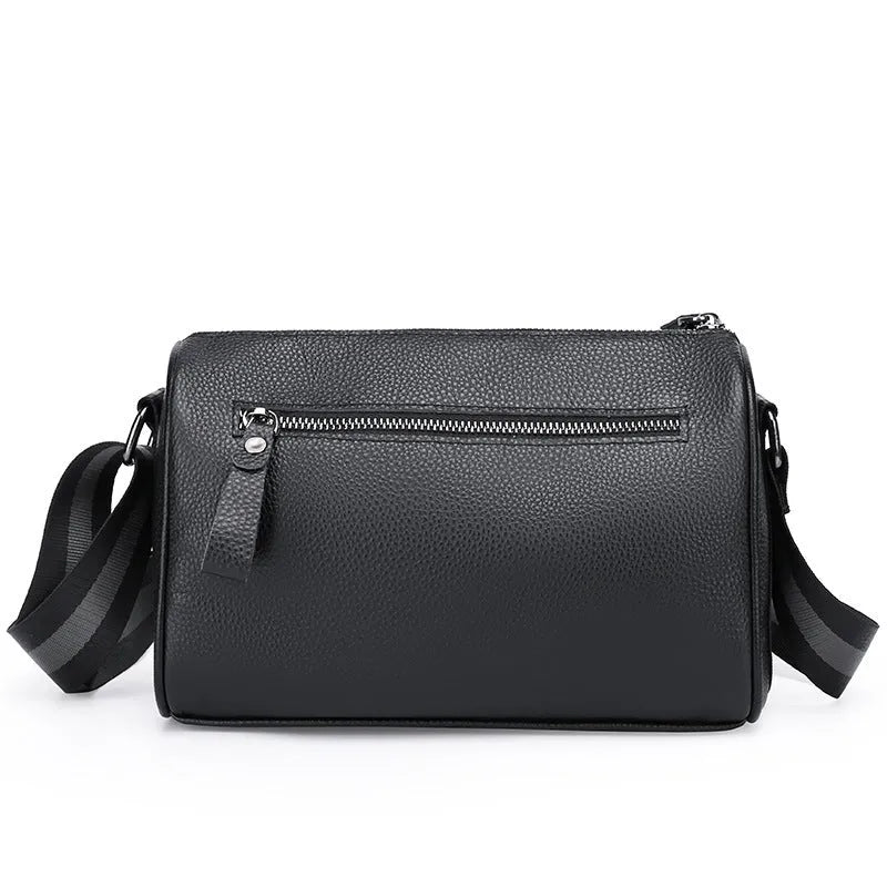 Black genuine leather one-shoulder crossbody bag showing front view and strap.