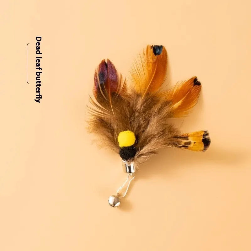Three steel wire cat toy replacement heads with small flying insect designs and scratch-resistant coating