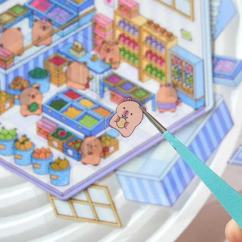 Capabala pre-cut 3D landscaping cartoon stickers on sheet, showing themes like bakery, bookstore, and flower shop.