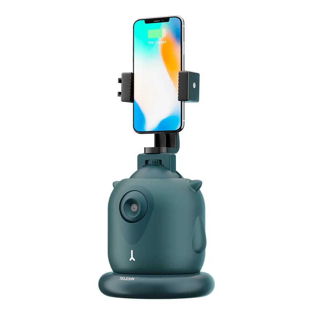 Dark green intelligent follow-up gimbal with AI face recognition showing smartphone mounting