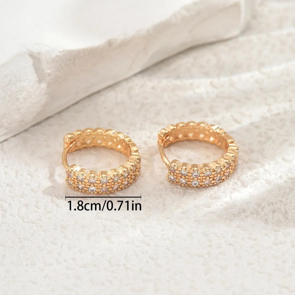Copper geometry pattern ear studs with circular dot and ring design elements
