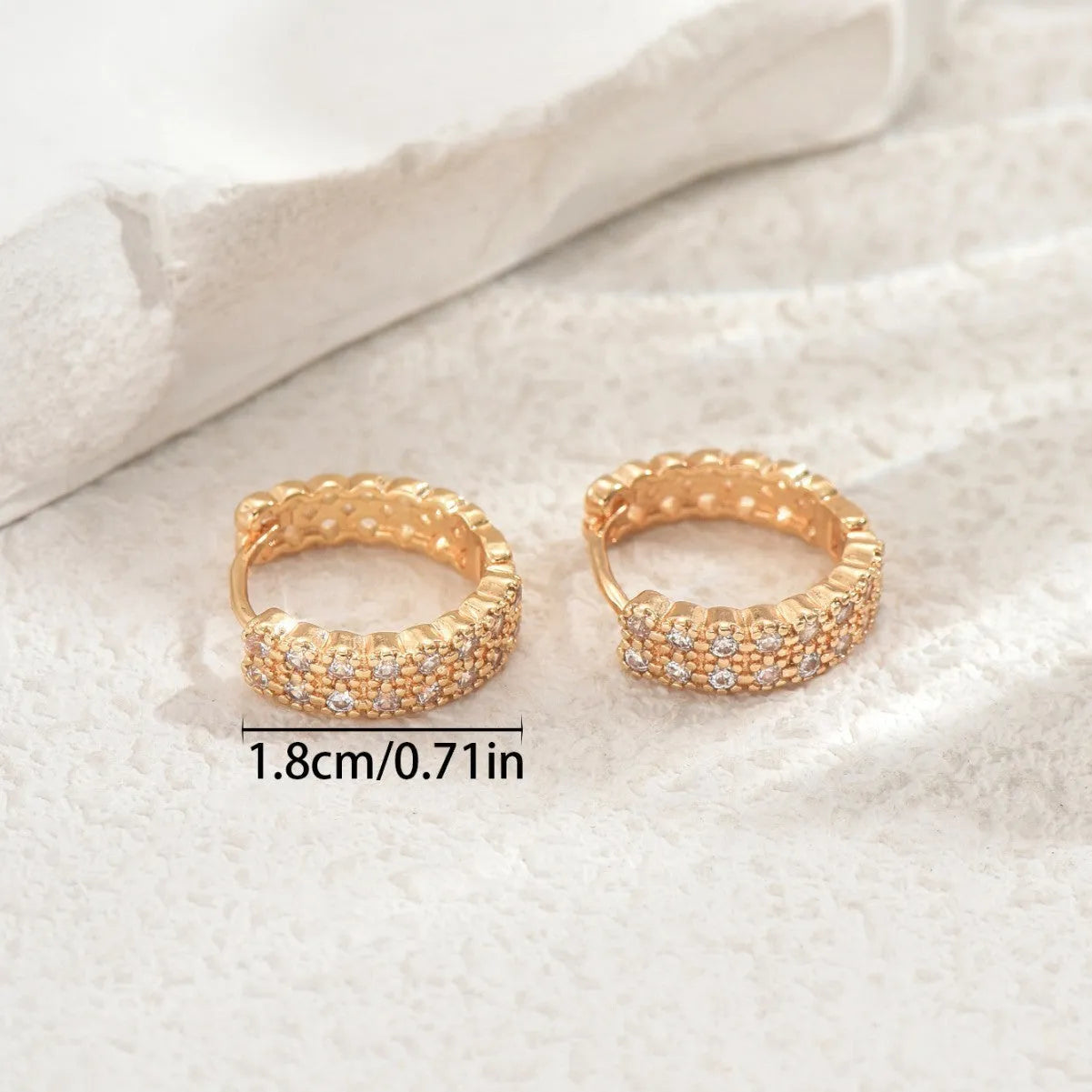 Copper geometry pattern ear studs with circular dot and ring design elements