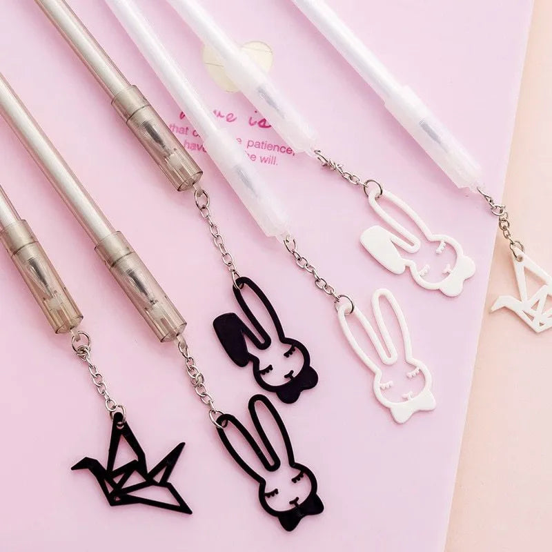 Plastic gel pen with paper crane or rabbit pendant decoration showing 0.38mm tip and 17cm length