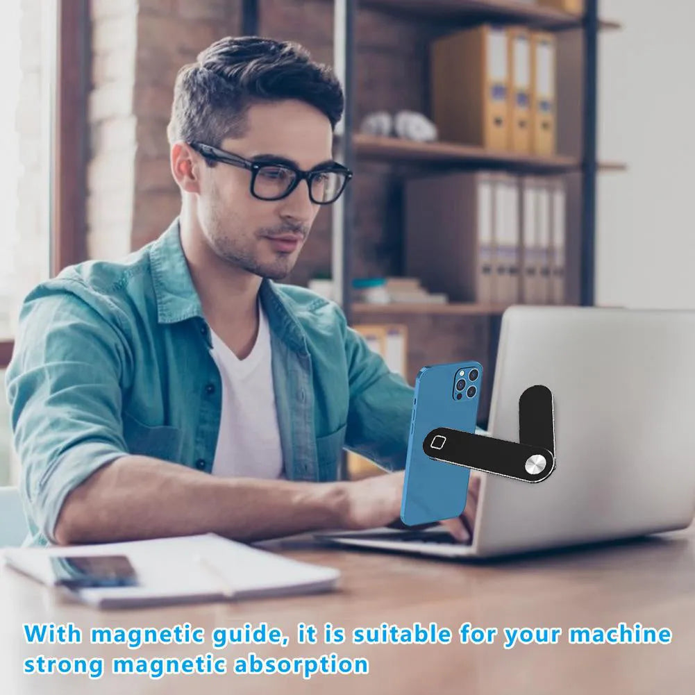 Aluminium laptop phone holder with magnetic clip mounted on laptop edge holding smartphone