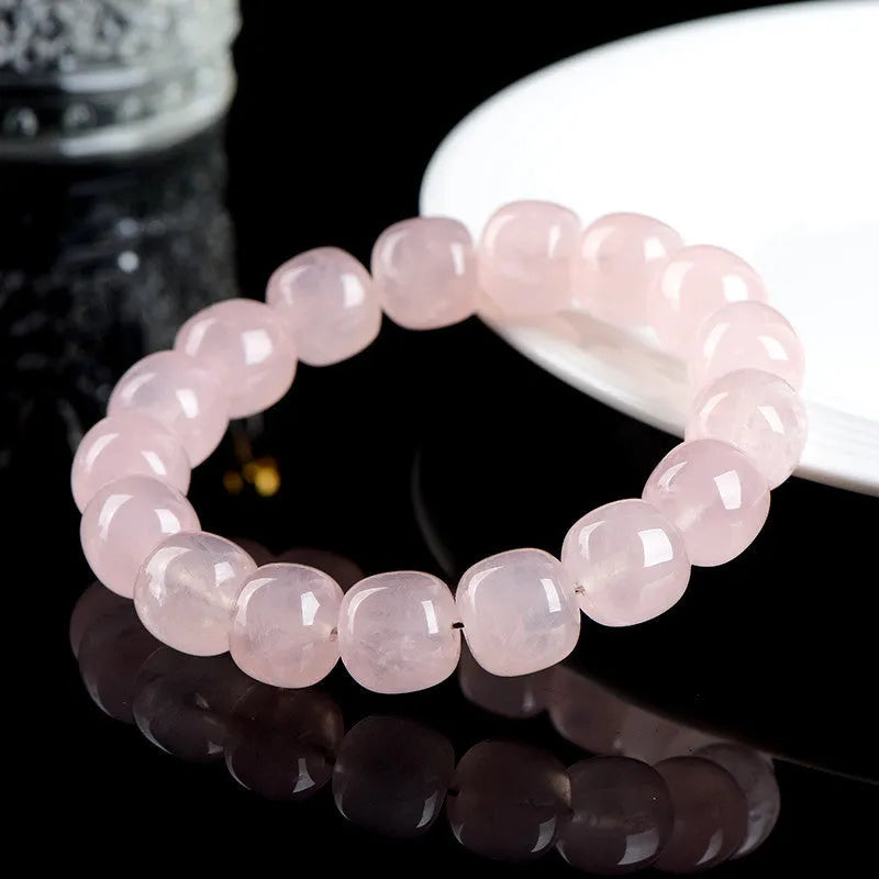 Natural bamboo crystal barrel bead bracelet with geometric design and pink colour