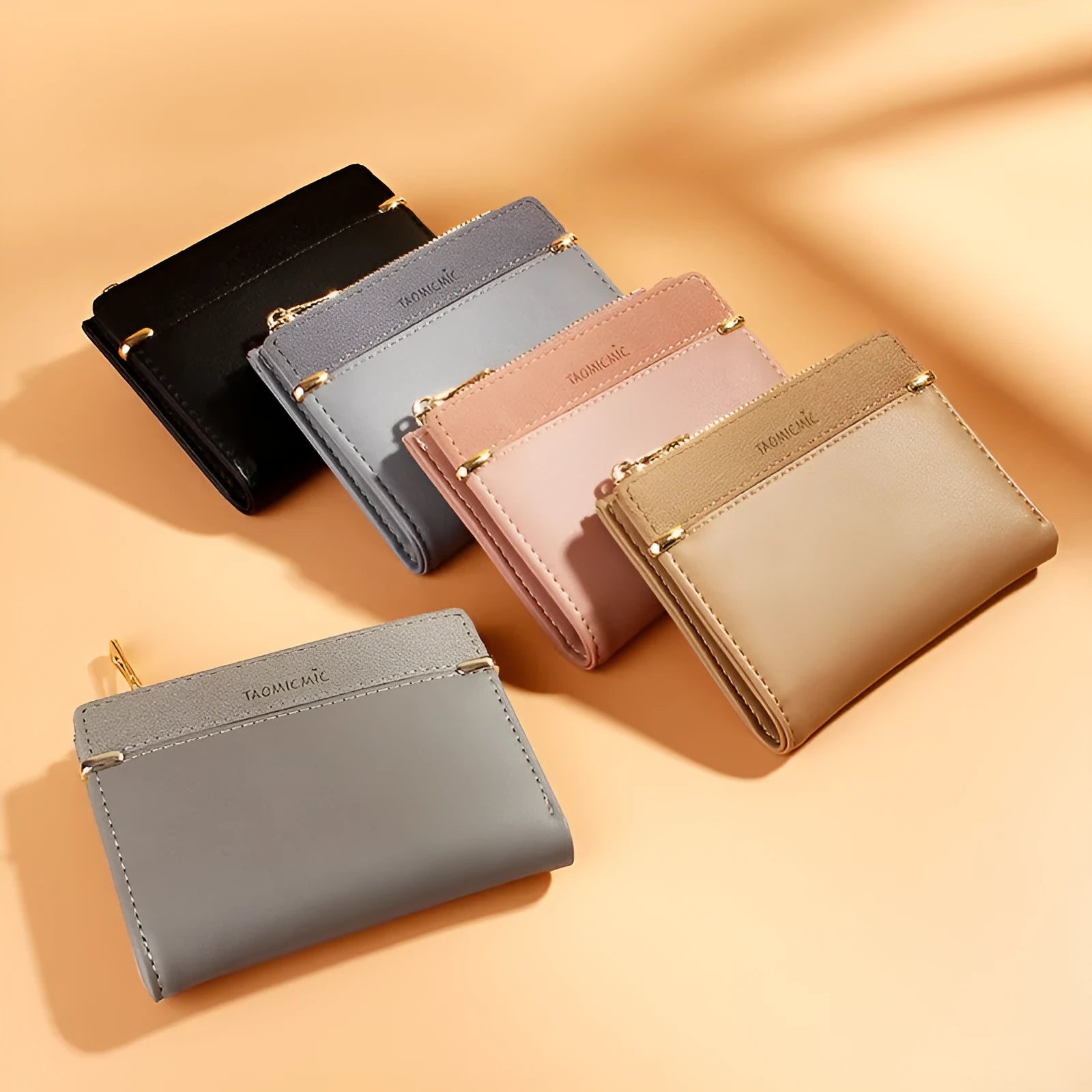 Ladies' black zip-around PU leather wallet open showing multiple card slots and internal compartments.
