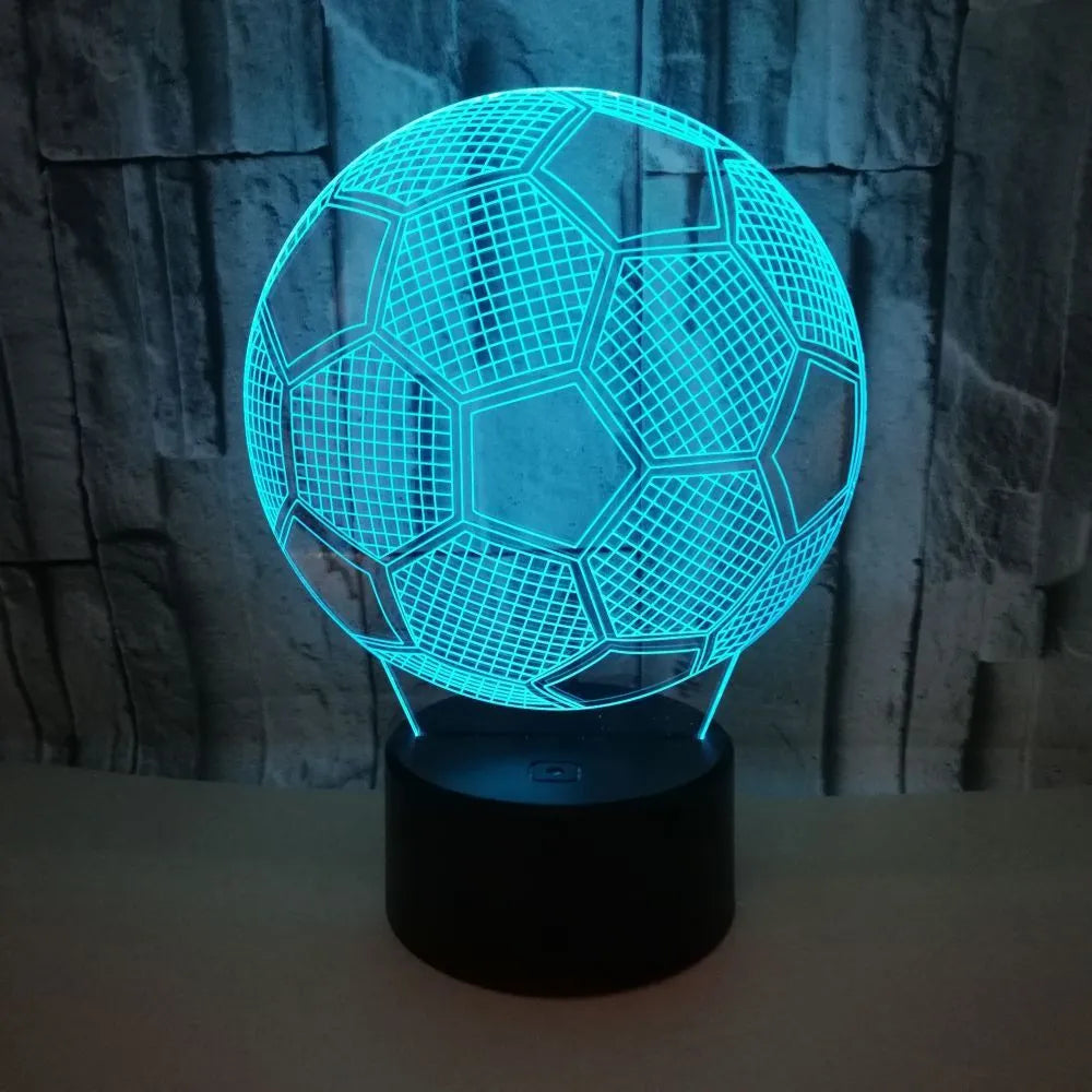 3D football night light with acrylic panel on ABS base, showing colourful projection.