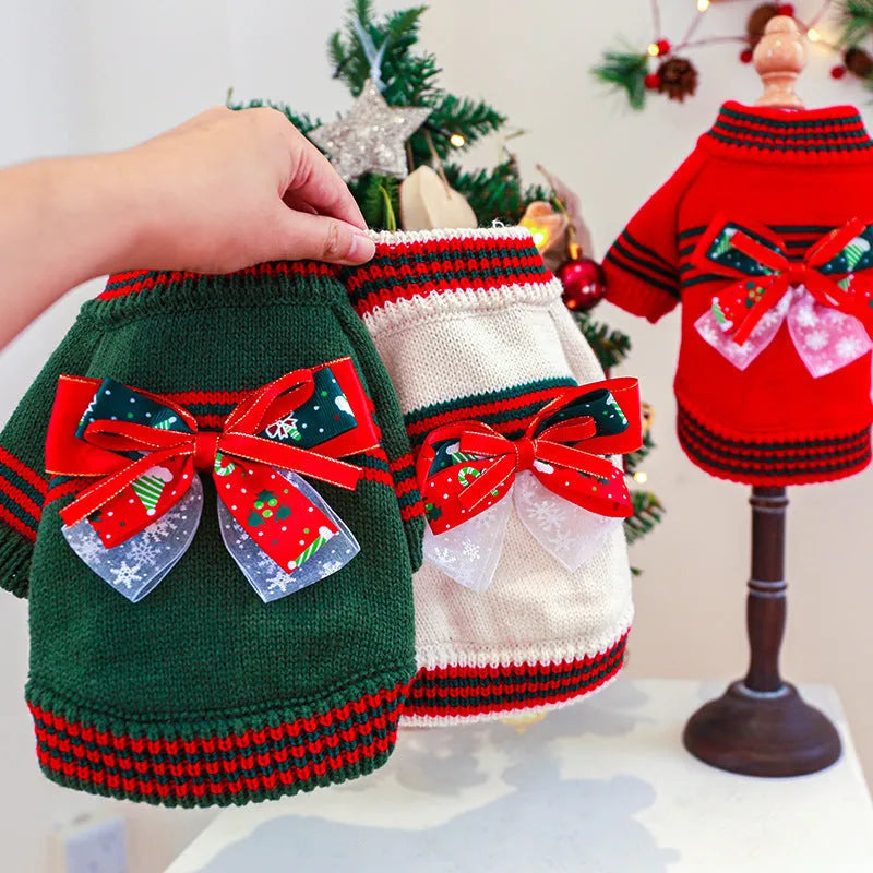Red Christmas-themed dog jumper with festive pattern on small breed dog