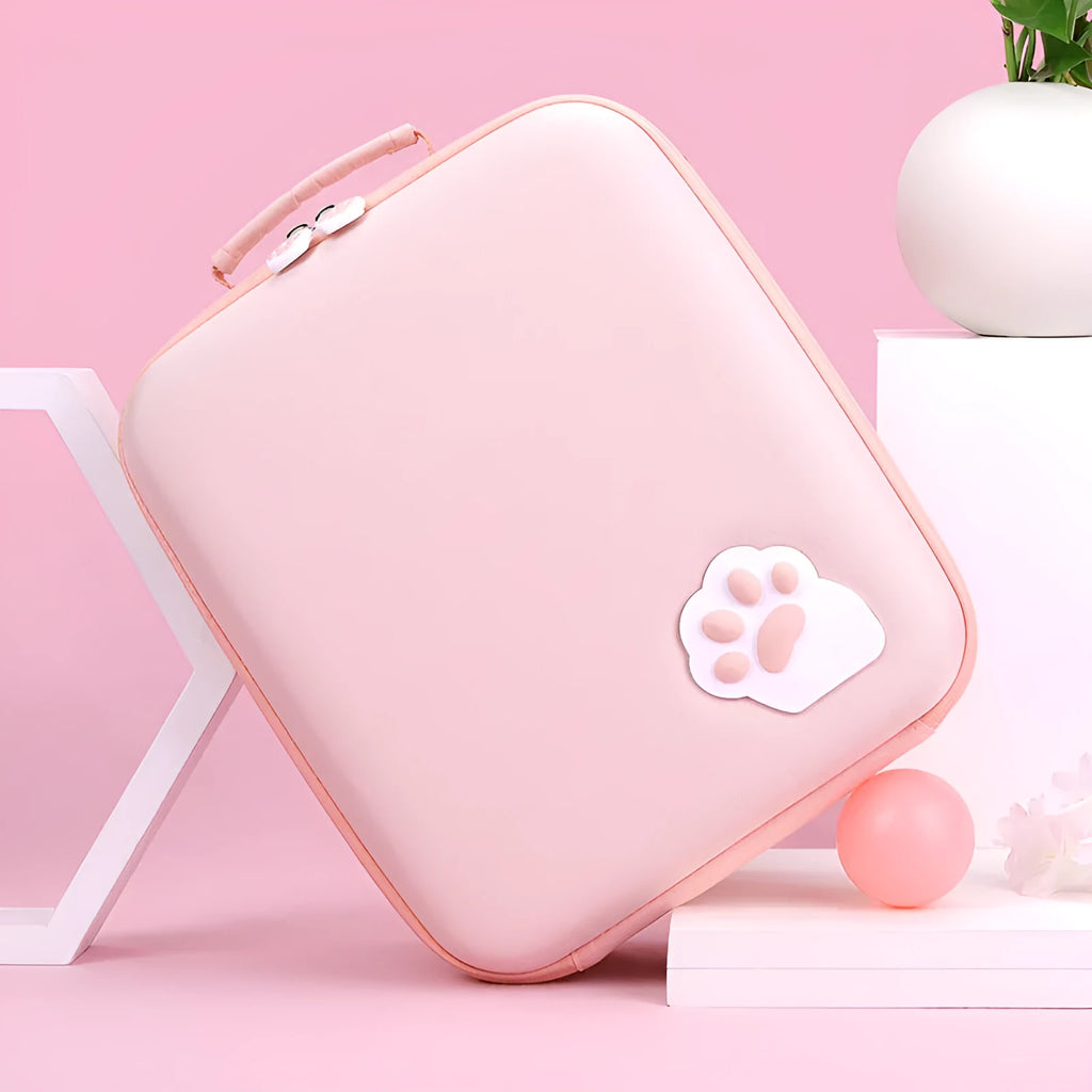 Cat claw design Nintendo Switch storage case in pink, open to show compartments for console and 21 game cartridges.