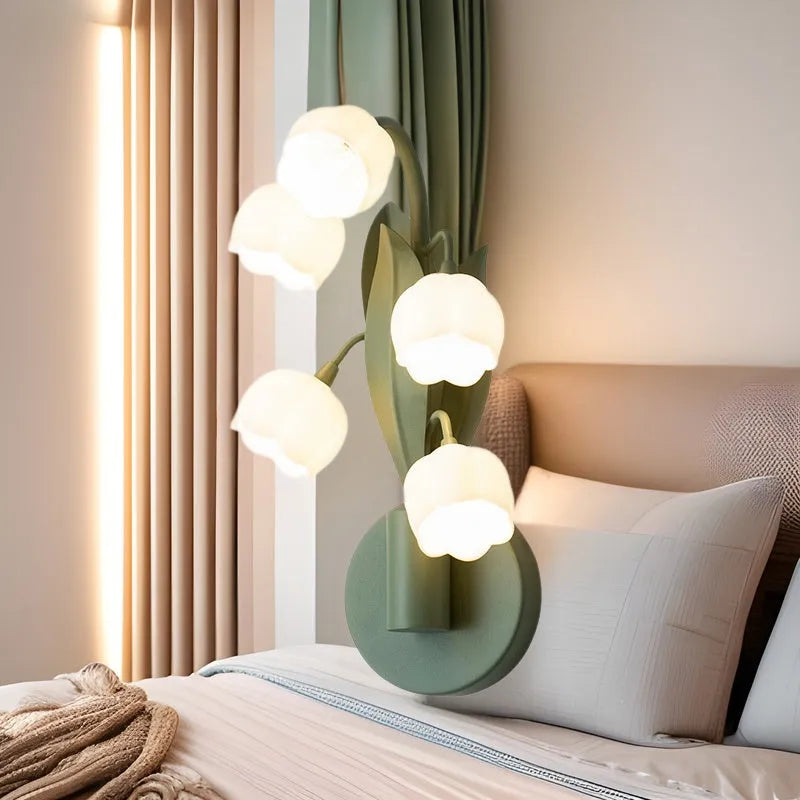 Green tricolour French pastoral wall lamp with minimalist Nordic design and white PC shade mounted on a wall.