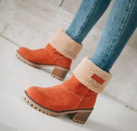 Women's mid-calf suede platform boots with a thick low heel in five colour options.
