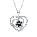 Gold colour dog paw print and heart necklace on cross chain for women