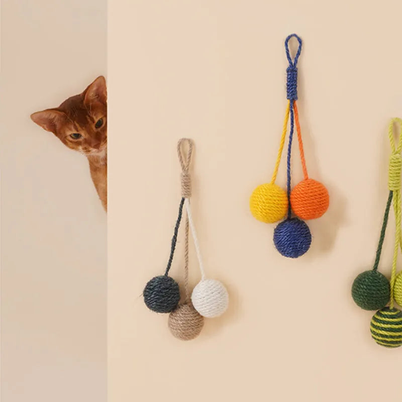 Bite-resistant cat teaser stick set with colourful catnip balls on blue background