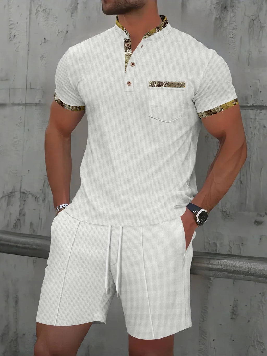 Men's grey zip-front polo collar short sleeve jacket and matching shorts set laid flat.