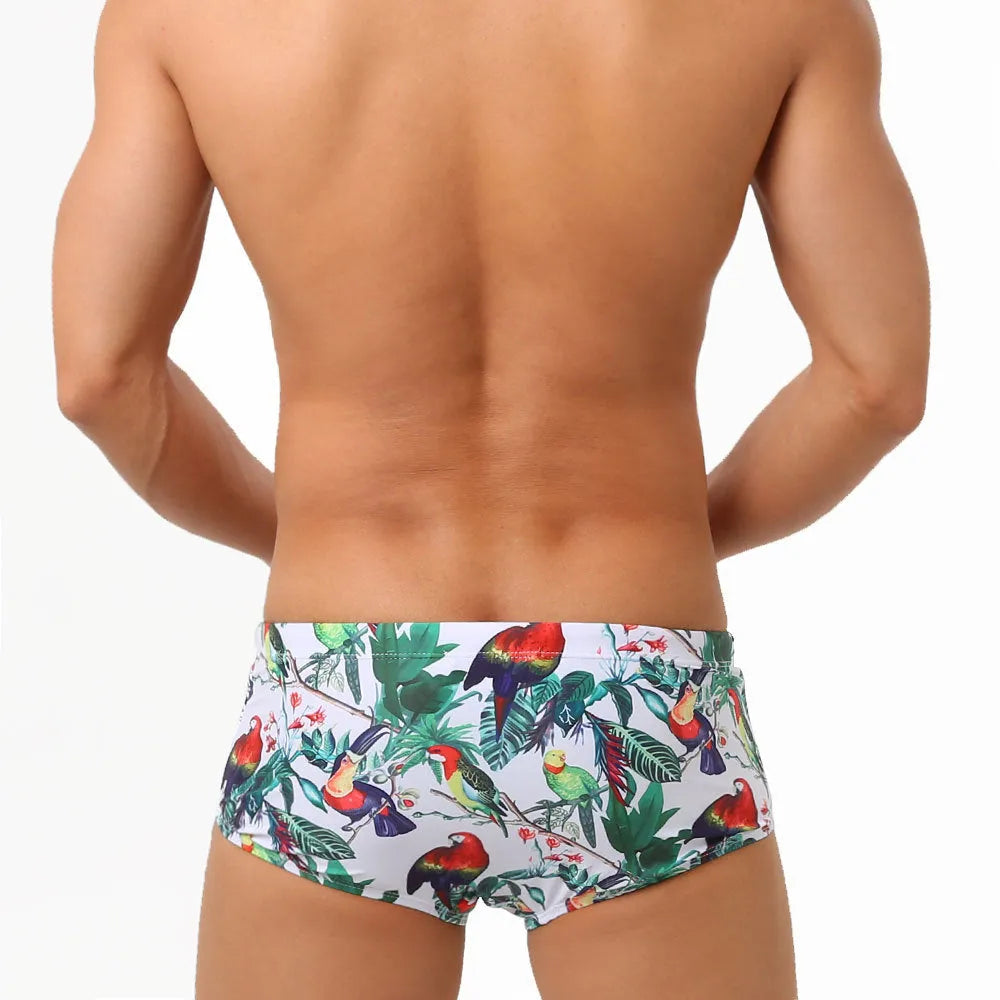 Men's swimming trunks with flower and bird print design in nylon fabric for beach and pool swimming
