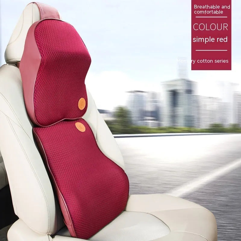 Black memory foam car headrest pillow and matching lumbar support pillow on a car seat.