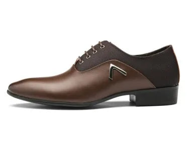 Men's black Oxford shoes with a rubber sole on a white background.