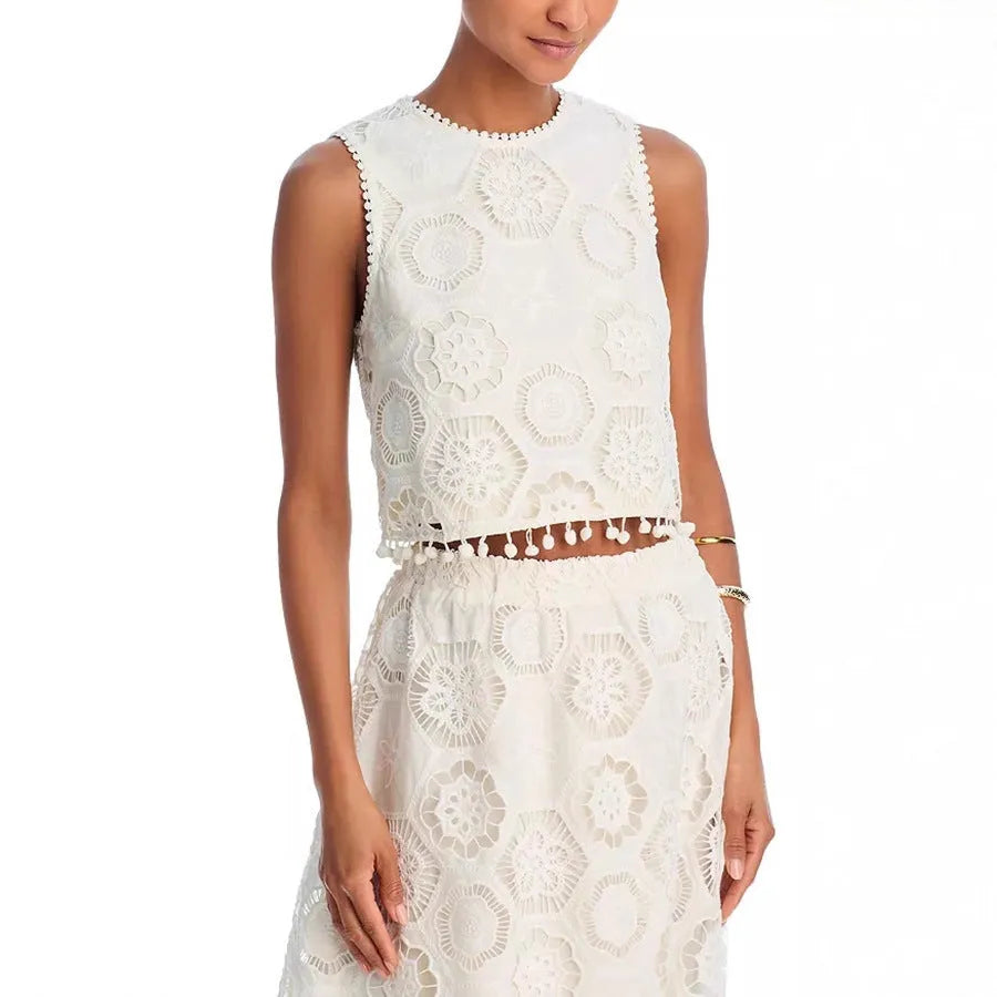White women's two-piece suit set with embroidered sleeveless top and matching long skirt