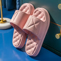 EVA bathroom slippers with 3.5cm sole in various colours on bathroom floor