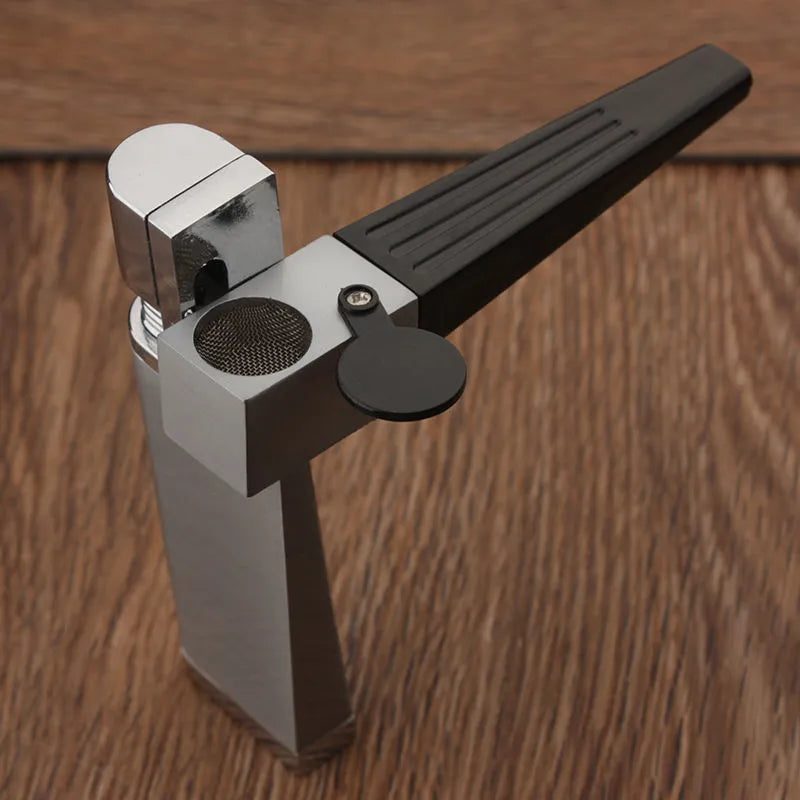 Silver foldable metal pipe lighter shown open, revealing lighter mechanism and small storage compartment.
