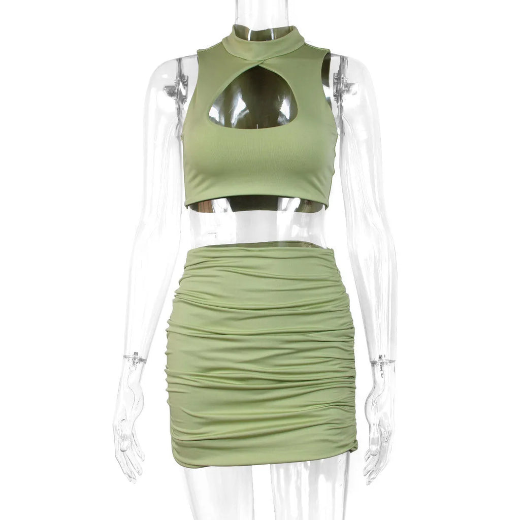 Light purple summer two-piece set with hollow vest top and split skirt on model