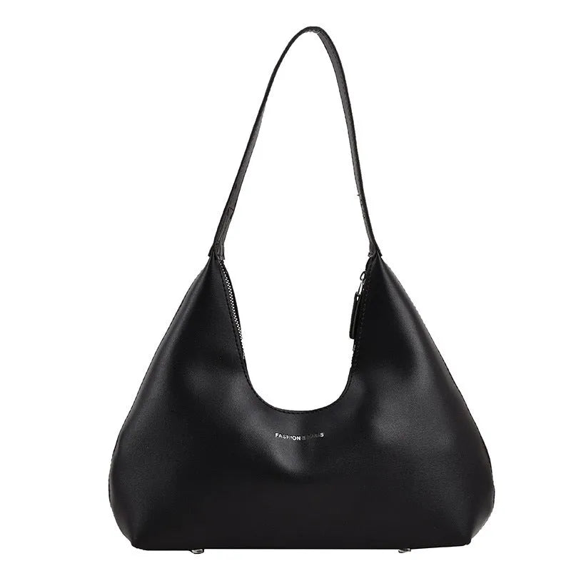 PU leather retro shoulder handbag in pillow design with single strap and internal organisation pockets