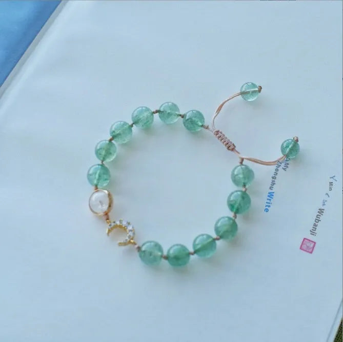 Handmade Hetian jade peach blossom strawberry quartz crystal bracelet for women showing strawberry quartz pearl and charm details