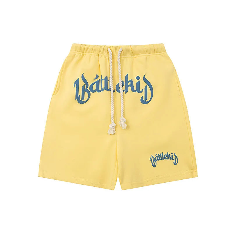 Loose-fit cropped sweatpants-style hip hop shorts in cotton blend fabric on a neutral background