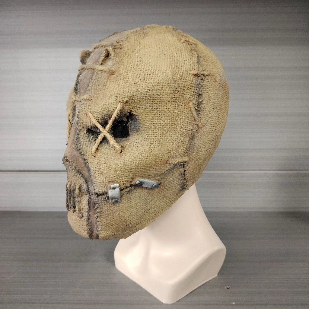 Latex horror head cover with detailed scar skull modelling measuring 31cm tall