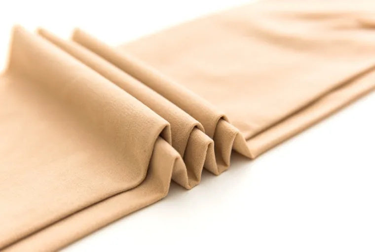Beige and black lifting hips and abdomen stovepipe shaping socks made from polyester fibre