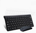 Black and white wireless keyboard and mouse set with USB receiver on wooden desk