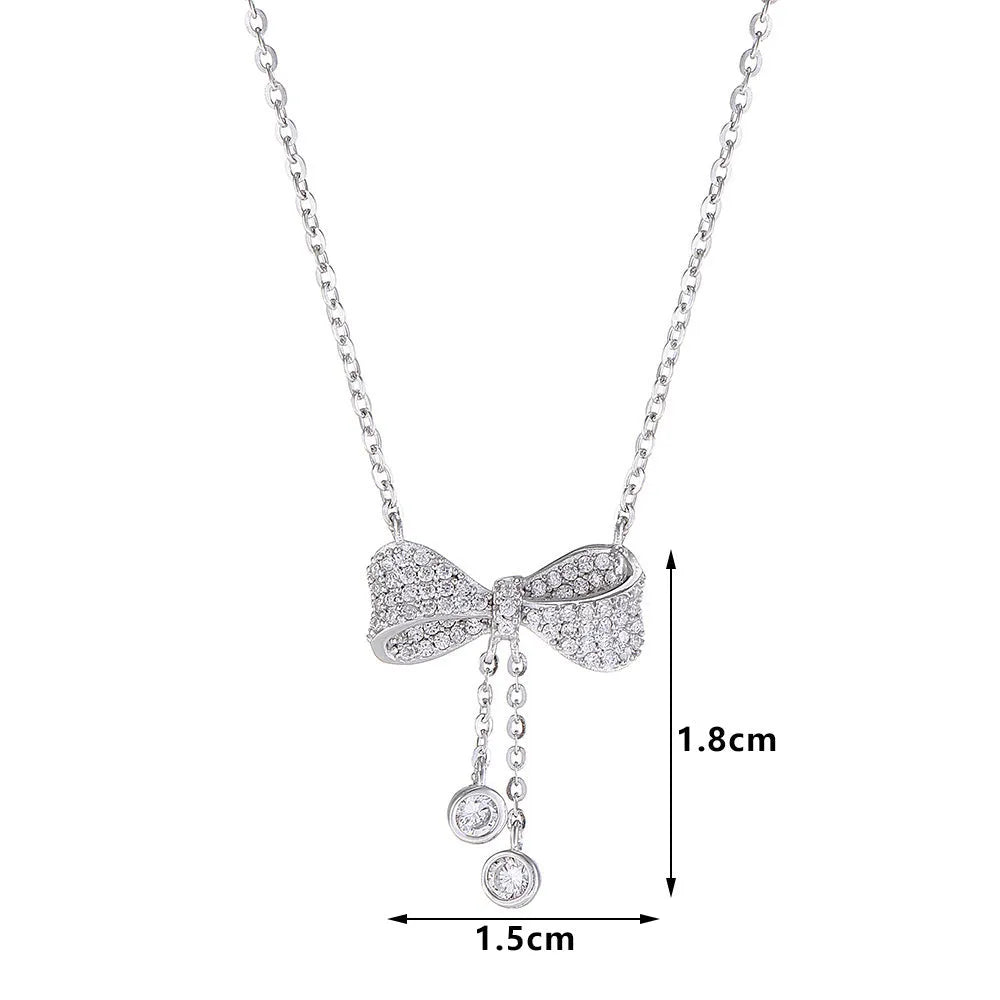 S925 sterling silver bow pendant necklace on adjustable O-ring chain, clavicle length