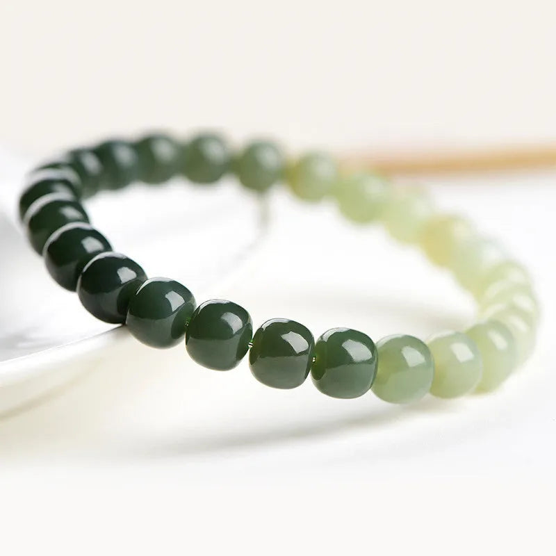 Natural Hetian jade bracelet with water gradient colour beads in two size options.
