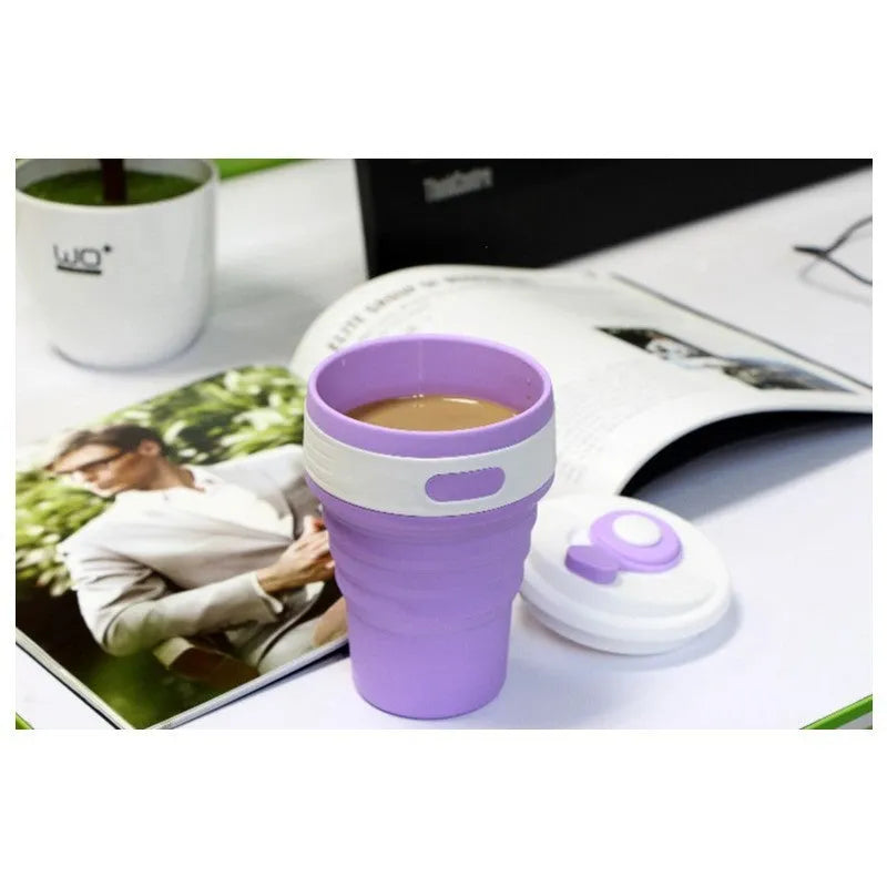Green collapsible silicone travel cup shown folded and expanded with leak-proof cover