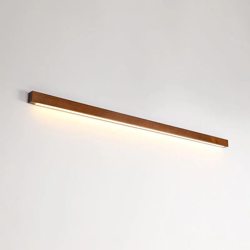 Modern walnut-colour wood and acrylic LED strip wall lamp in 60cm, 80cm or 120cm lengths.