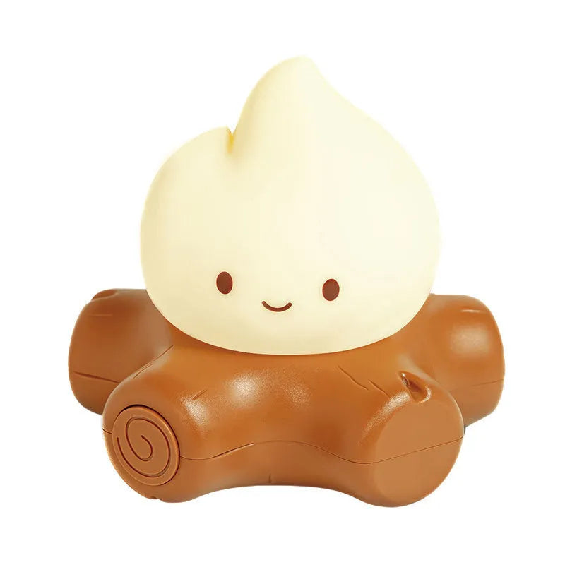 Silicone small fire pile cartoon night light with ABS shade showing warm yellow illumination