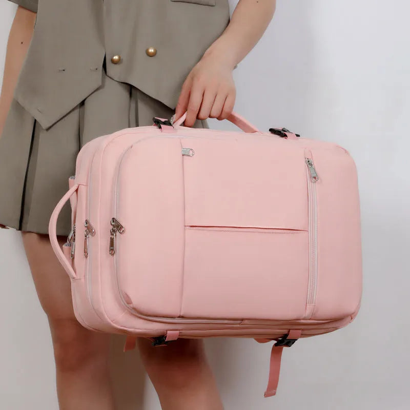 Waterproof oxford cloth backpack for a 15.6 inch laptop, shown in grey colour with multiple zippered pockets.