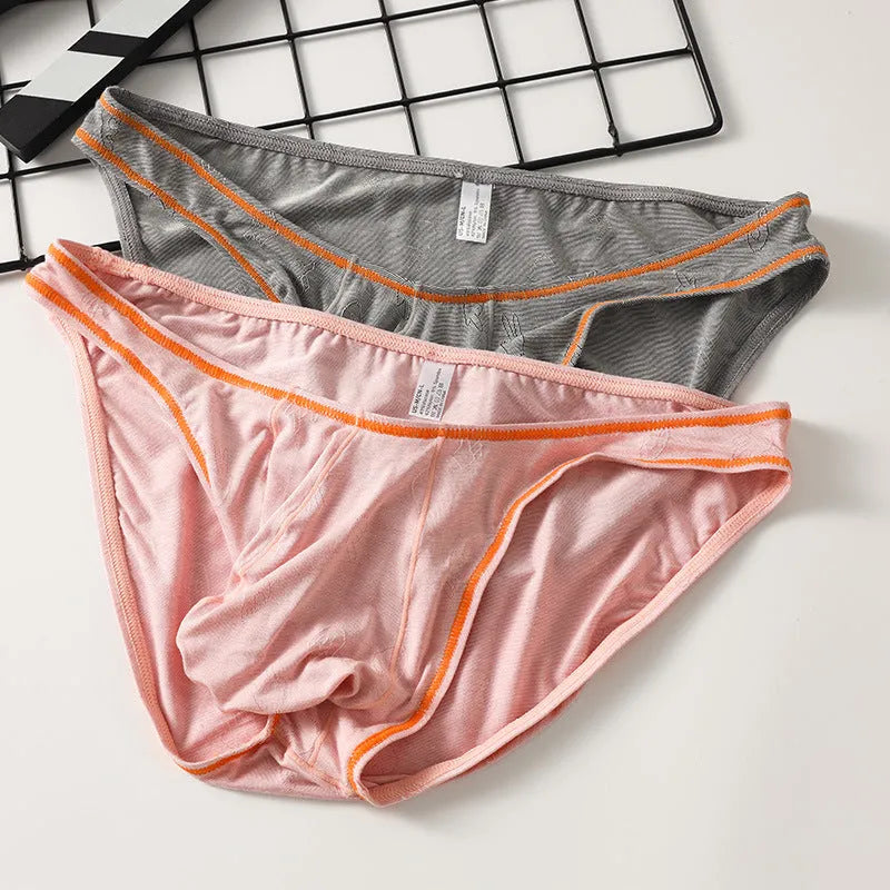 Men's ice silk modal underwear with butt-lift design in multiple colours.