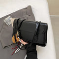 Women's brown Maillard PU leather shoulder bag with square design and pendant detail