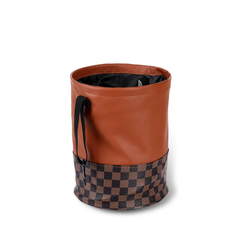 Leather retractable folding car trash can with handle shown in vehicle interior