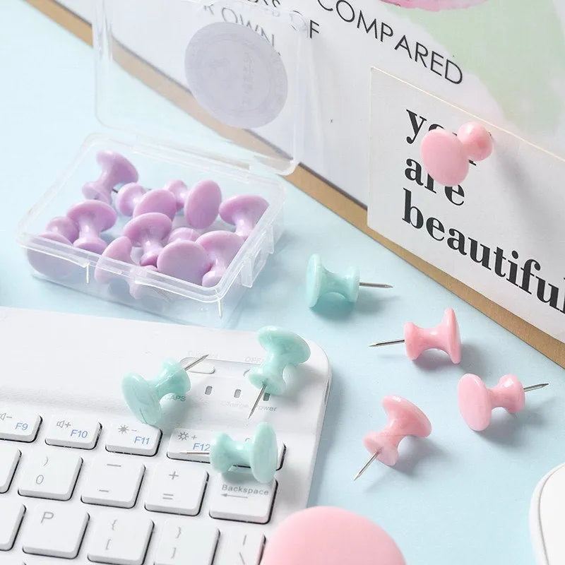 Plastic push pins in cherry blossom pink, mint green, and lavender colours showing large and small size options