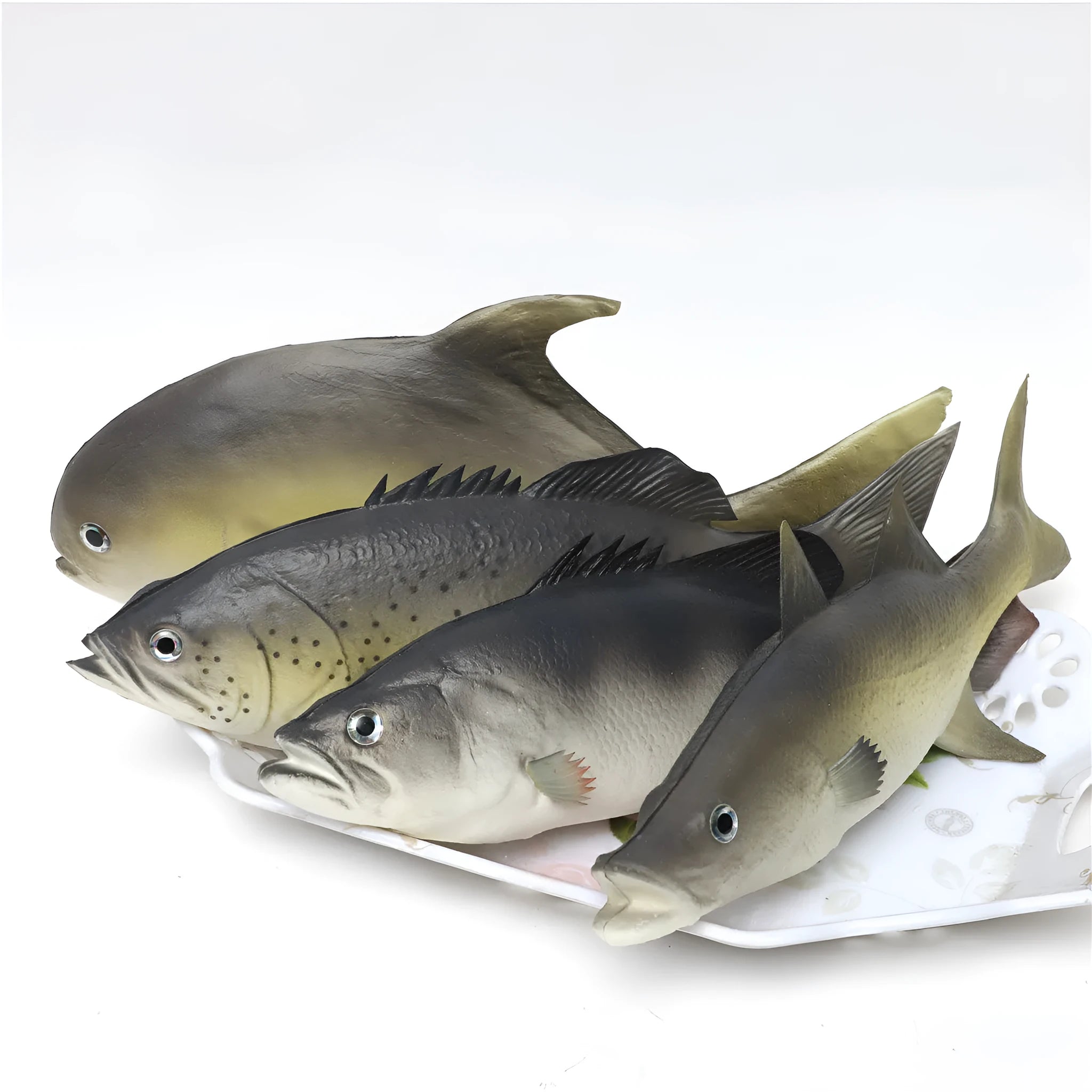 Set of three realistic PU simulated fish ornaments: yellow-fin tuna, small tuna, and yellow croaker.