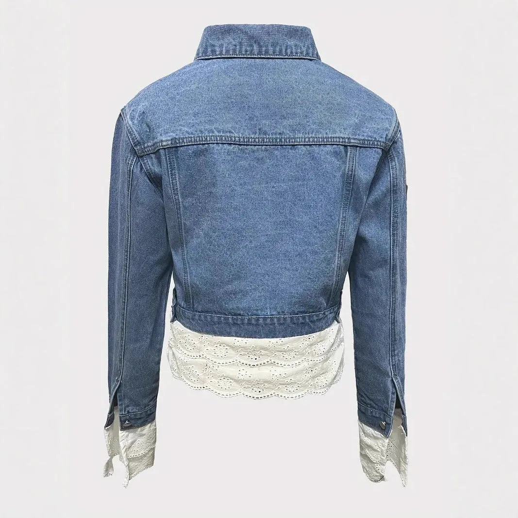 Blue women's denim jacket with decorative lace stitching on the front, long sleeves.