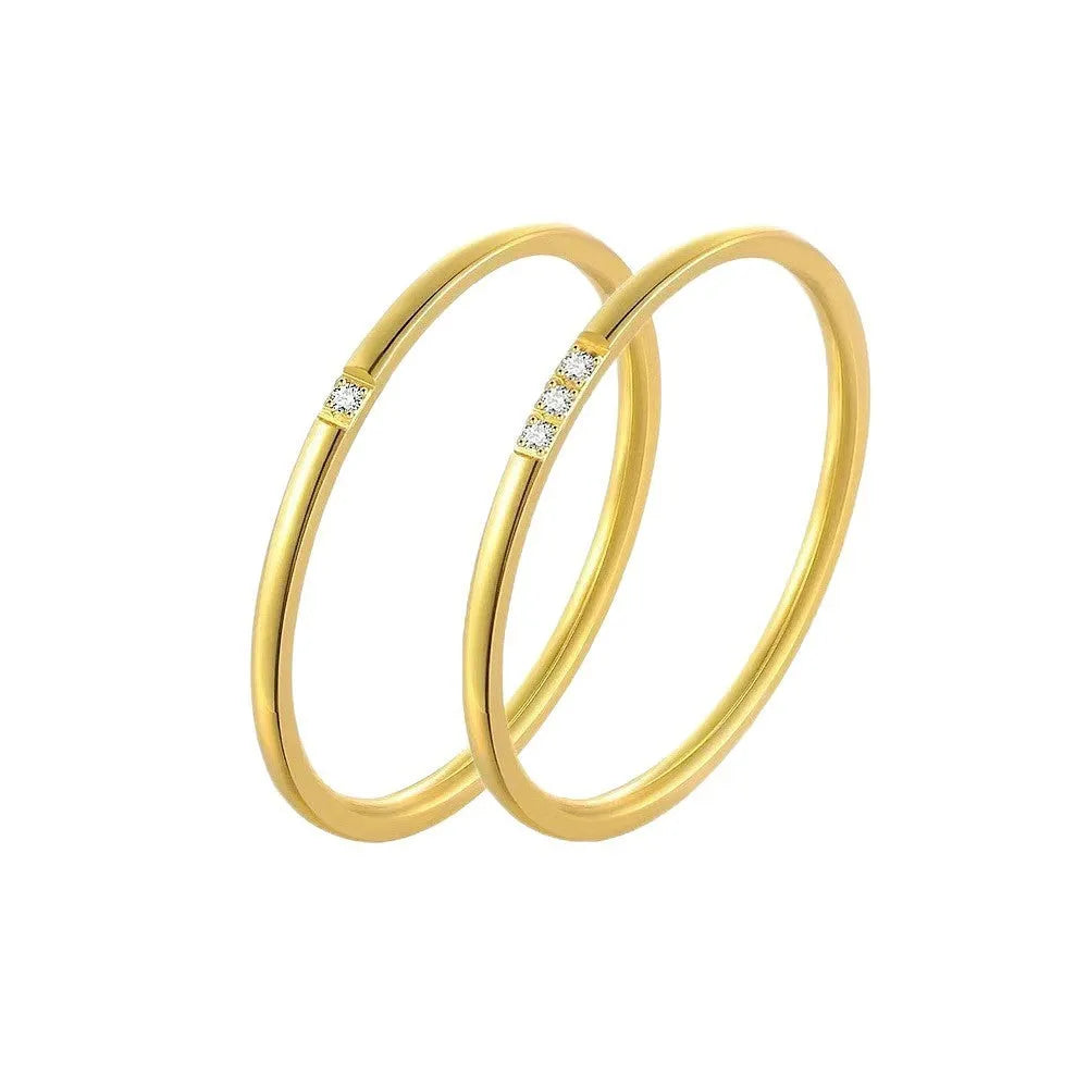 Stainless steel diamond-set ring in silver, gold or rose gold with 1 or 3 round stones, sizes 5 to 11