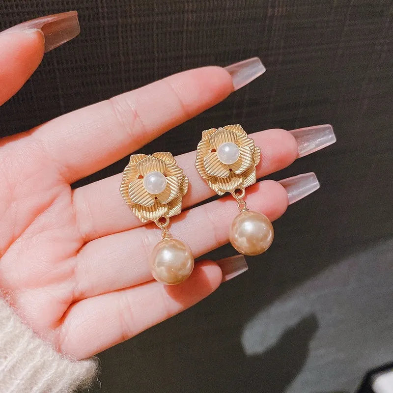 Hong Kong style gold colour floral stud earrings with opal stones and needle rose design