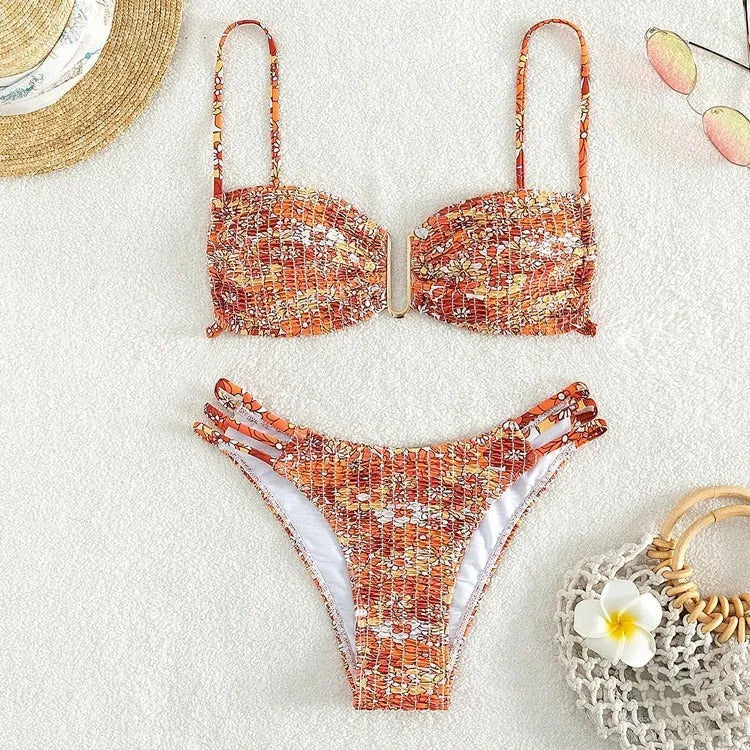 Women's floral print bikini swimsuit in high-waisted brief style.