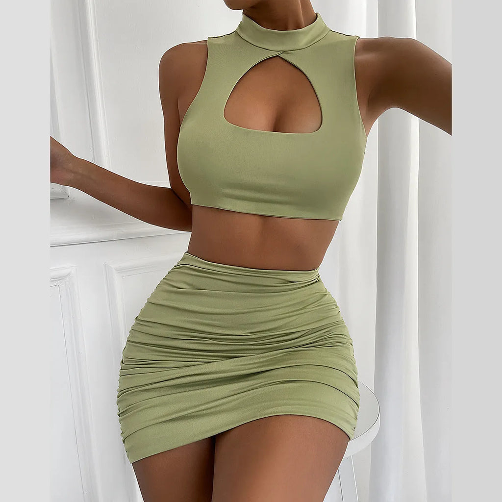 Light purple summer two-piece set with hollow vest top and split skirt on model